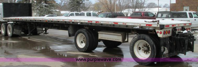 image for item E5049 1995 Trail King NXT152 flatbed trailer