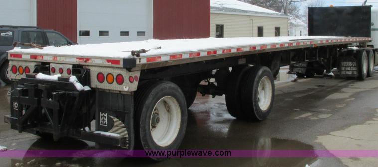 image for item E5049 1995 Trail King NXT152 flatbed trailer