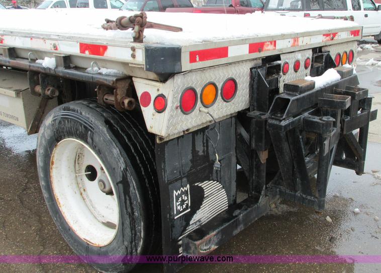 image for item E5049 1995 Trail King NXT152 flatbed trailer