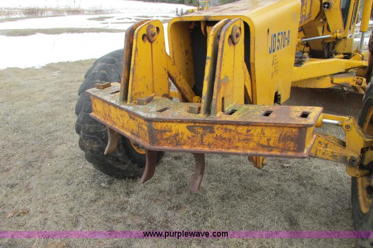 image for item E5061 1975 John Deere 570A motor grader