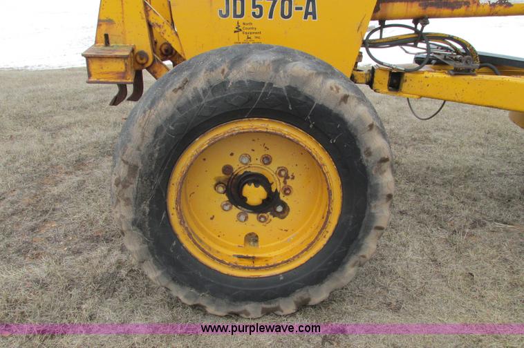 image for item E5061 1975 John Deere 570A motor grader
