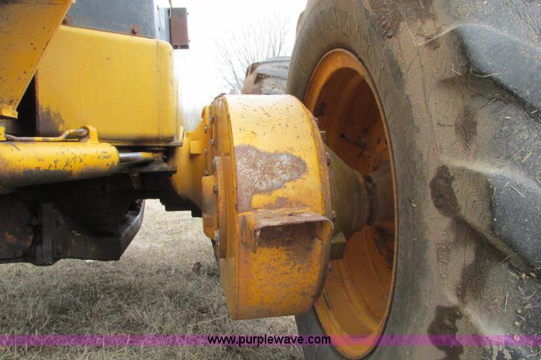 image for item E5061 1975 John Deere 570A motor grader