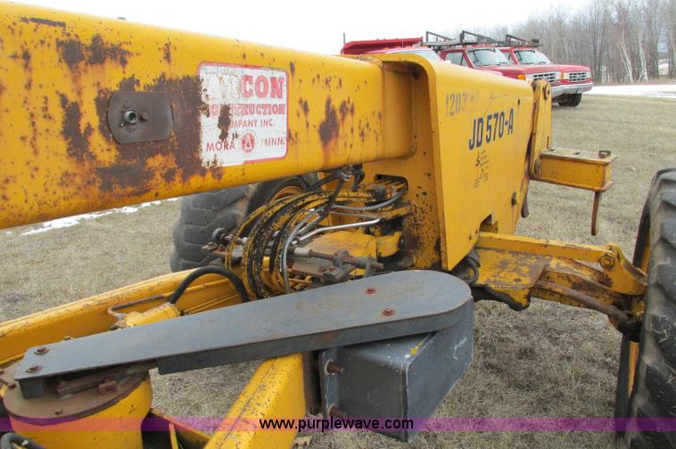 image for item E5061 1975 John Deere 570A motor grader