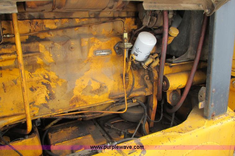 image for item E5061 1975 John Deere 570A motor grader