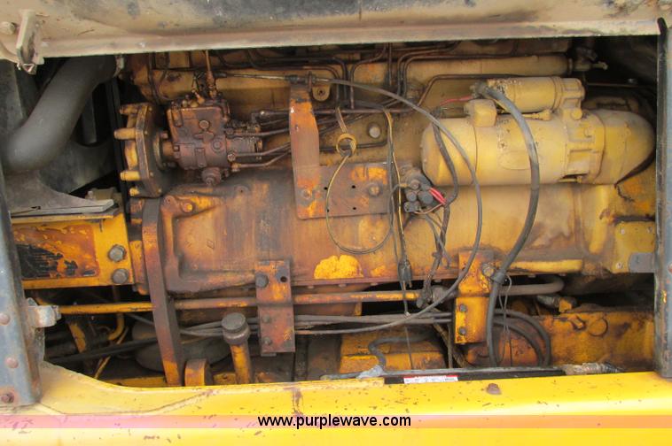 image for item E5061 1975 John Deere 570A motor grader