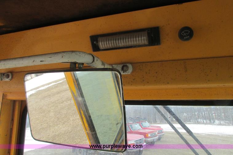 image for item E5061 1975 John Deere 570A motor grader