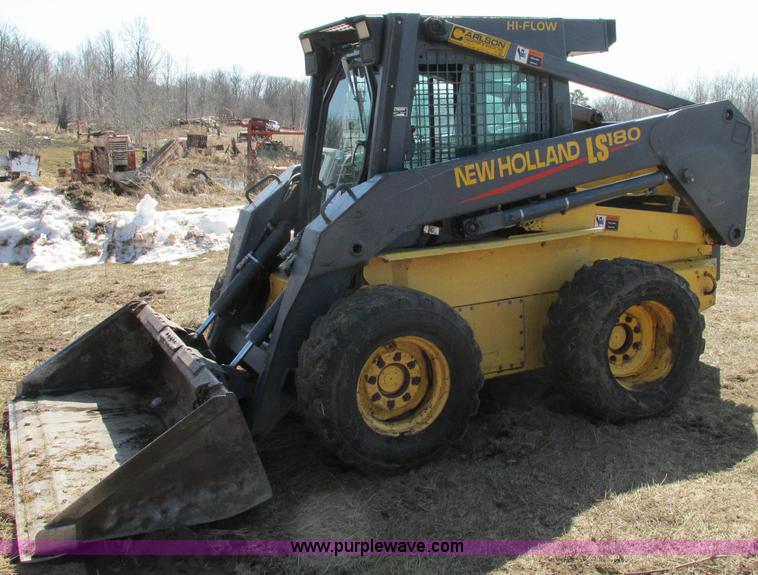 image for item E5062 New Holland LS180 skid steer