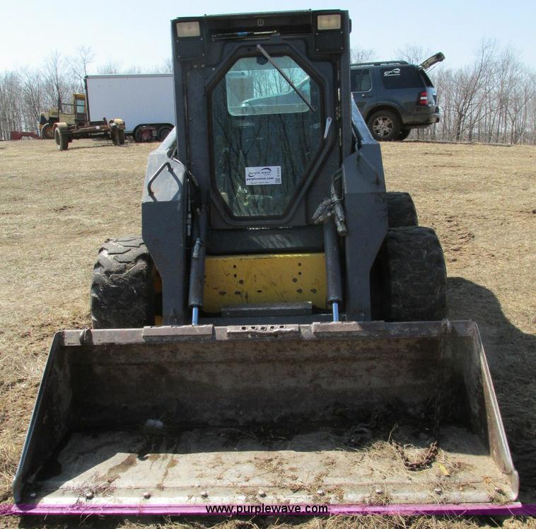 image for item E5062 New Holland LS180 skid steer