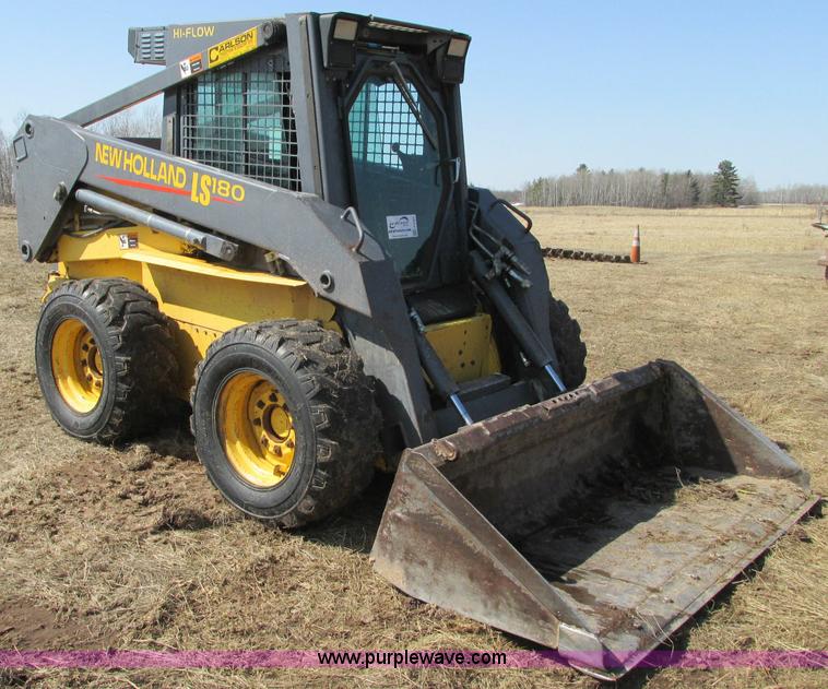 image for item E5062 New Holland LS180 skid steer