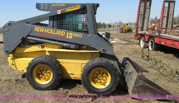 image for item E5062 New Holland LS180 skid steer