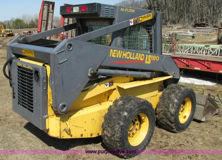 image for item E5062 New Holland LS180 skid steer