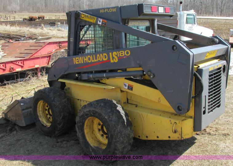 image for item E5062 New Holland LS180 skid steer