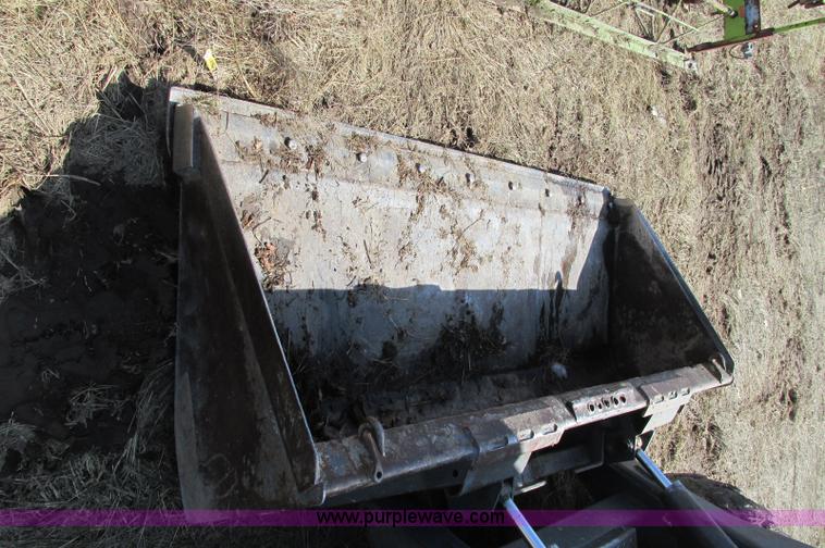 image for item E5062 New Holland LS180 skid steer