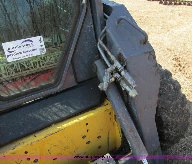 image for item E5062 New Holland LS180 skid steer