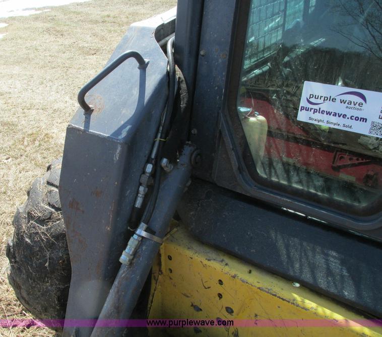 image for item E5062 New Holland LS180 skid steer