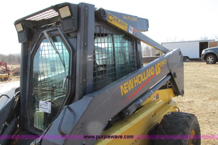 image for item E5062 New Holland LS180 skid steer