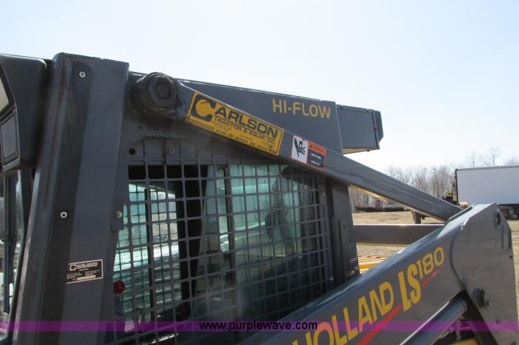 image for item E5062 New Holland LS180 skid steer