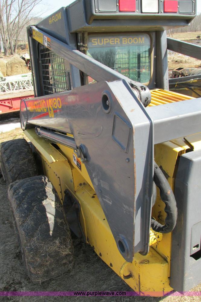 image for item E5062 New Holland LS180 skid steer