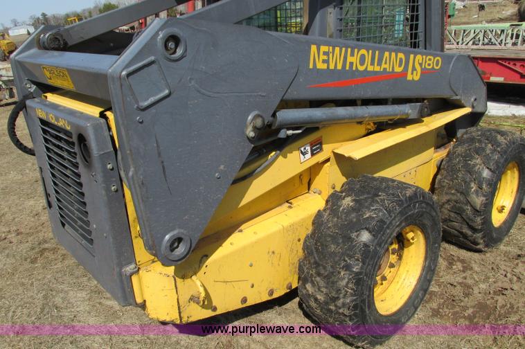 image for item E5062 New Holland LS180 skid steer