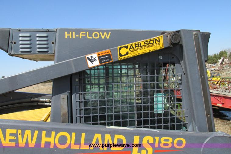 image for item E5062 New Holland LS180 skid steer