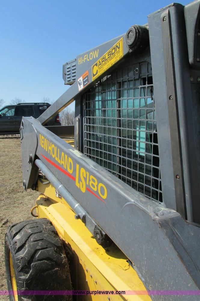 image for item E5062 New Holland LS180 skid steer