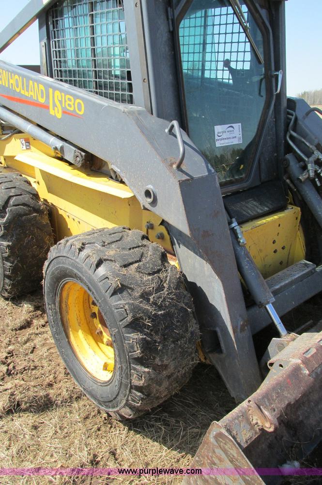 image for item E5062 New Holland LS180 skid steer