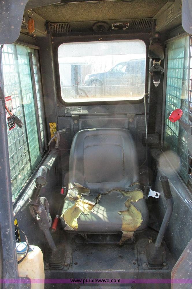 image for item E5062 New Holland LS180 skid steer