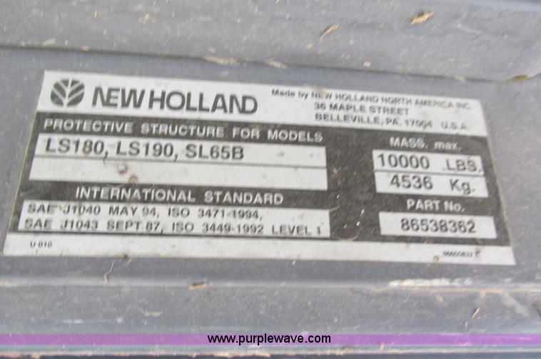 image for item E5062 New Holland LS180 skid steer