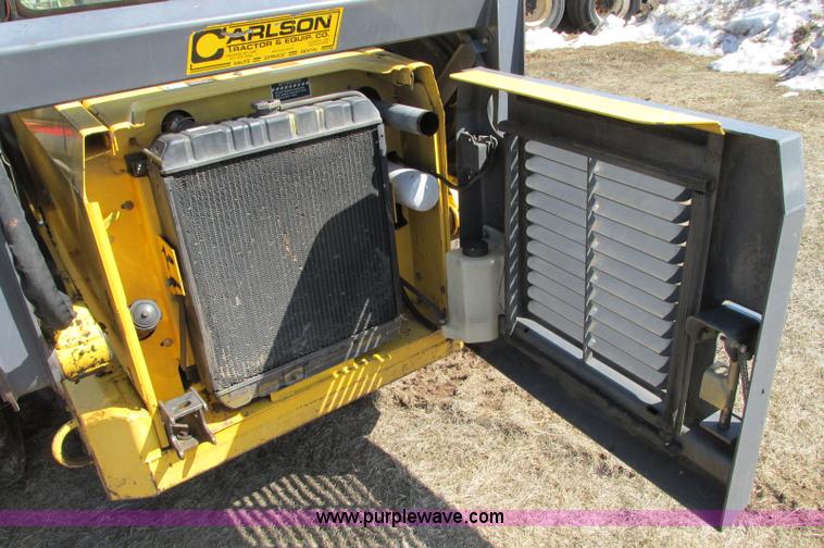 image for item E5062 New Holland LS180 skid steer