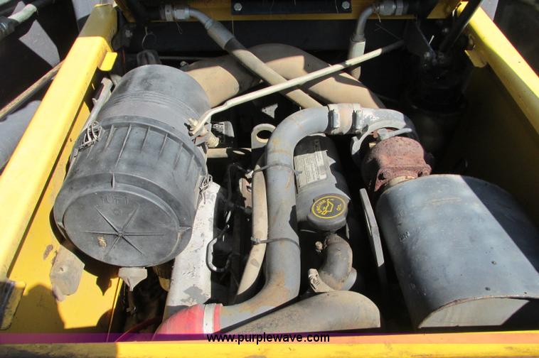 image for item E5062 New Holland LS180 skid steer