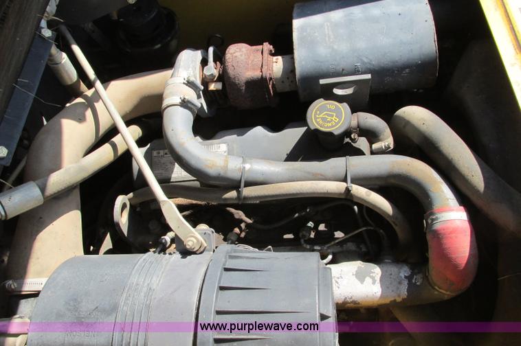 image for item E5062 New Holland LS180 skid steer