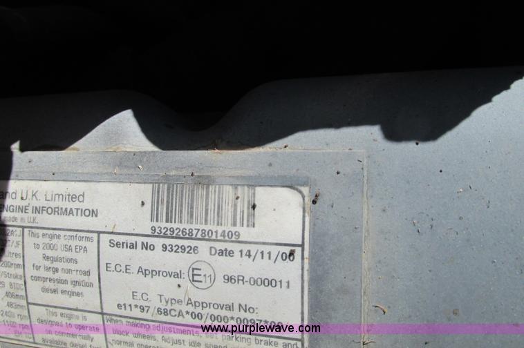 image for item E5062 New Holland LS180 skid steer