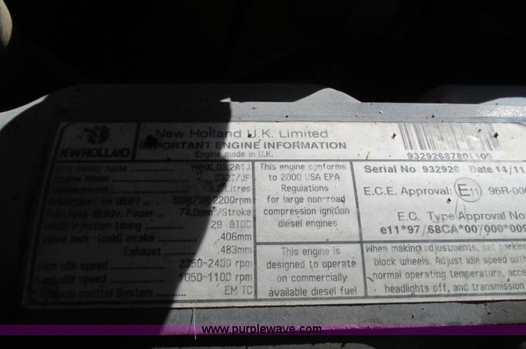 image for item E5062 New Holland LS180 skid steer