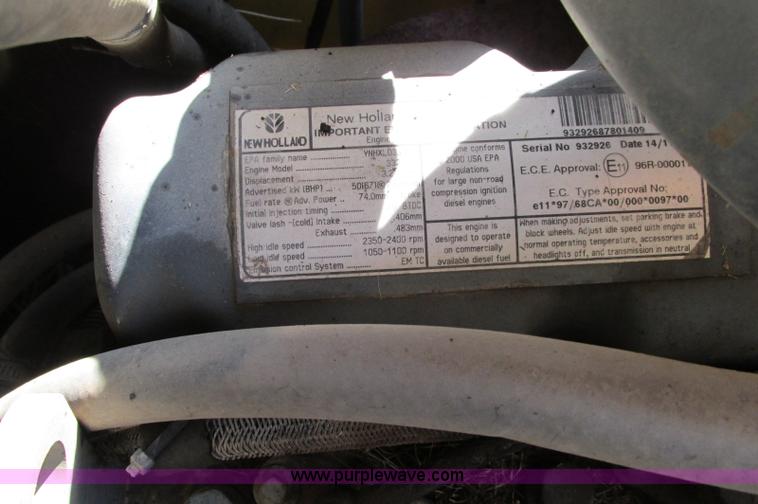 image for item E5062 New Holland LS180 skid steer