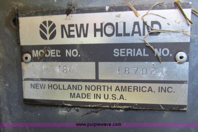 image for item E5062 New Holland LS180 skid steer