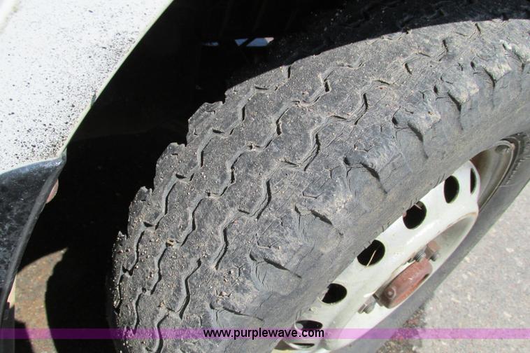 image for item E5072 1999 Mitsubishi minicab truck with dump bed