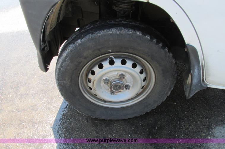 image for item E5072 1999 Mitsubishi minicab truck with dump bed