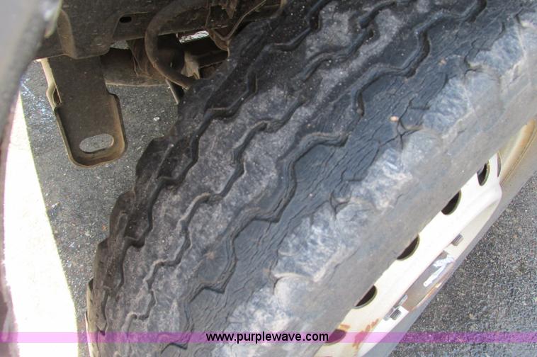 image for item E5072 1999 Mitsubishi minicab truck with dump bed