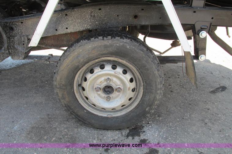 image for item E5072 1999 Mitsubishi minicab truck with dump bed