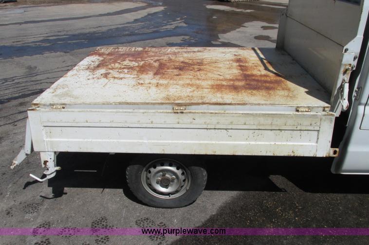 image for item E5072 1999 Mitsubishi minicab truck with dump bed