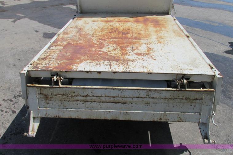 image for item E5072 1999 Mitsubishi minicab truck with dump bed