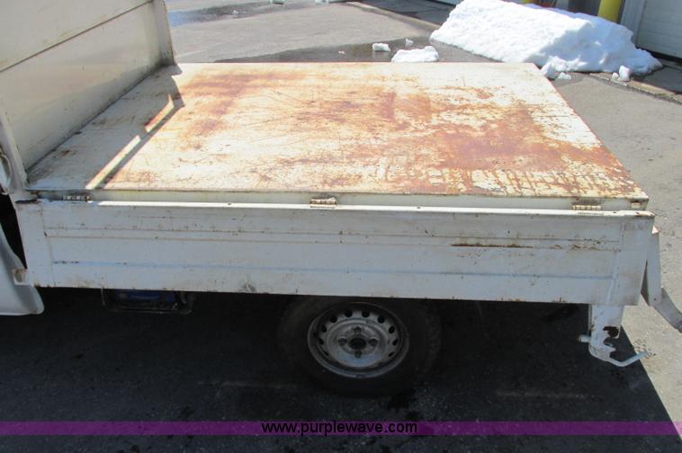 image for item E5072 1999 Mitsubishi minicab truck with dump bed