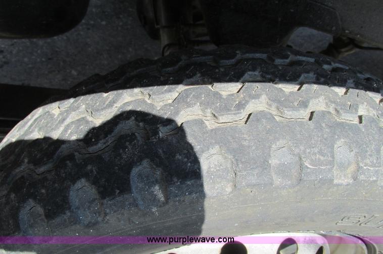 image for item E5072 1999 Mitsubishi minicab truck with dump bed