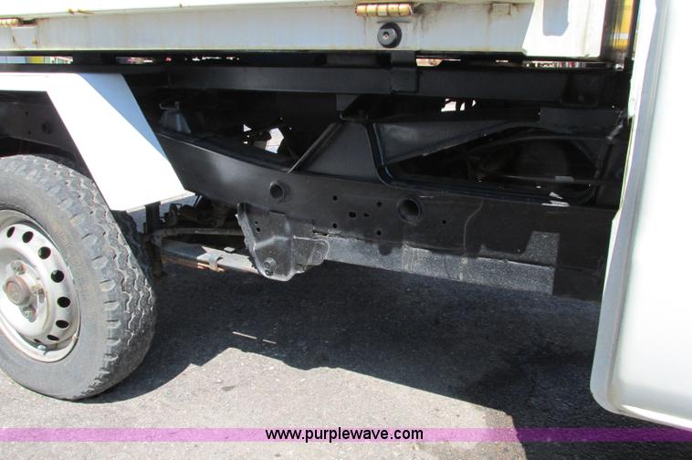 image for item E5072 1999 Mitsubishi minicab truck with dump bed