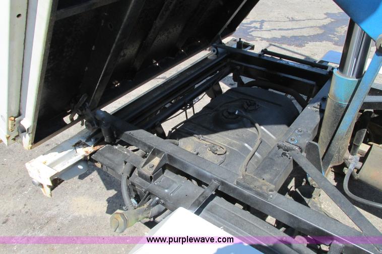 image for item E5072 1999 Mitsubishi minicab truck with dump bed