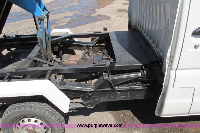 image for item E5072 1999 Mitsubishi minicab truck with dump bed