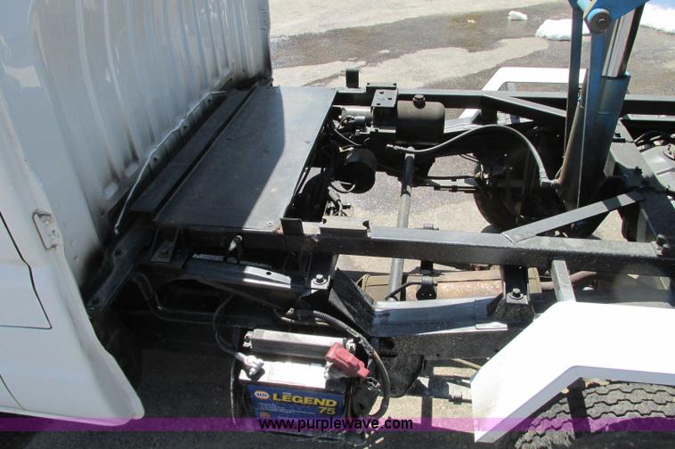 image for item E5072 1999 Mitsubishi minicab truck with dump bed