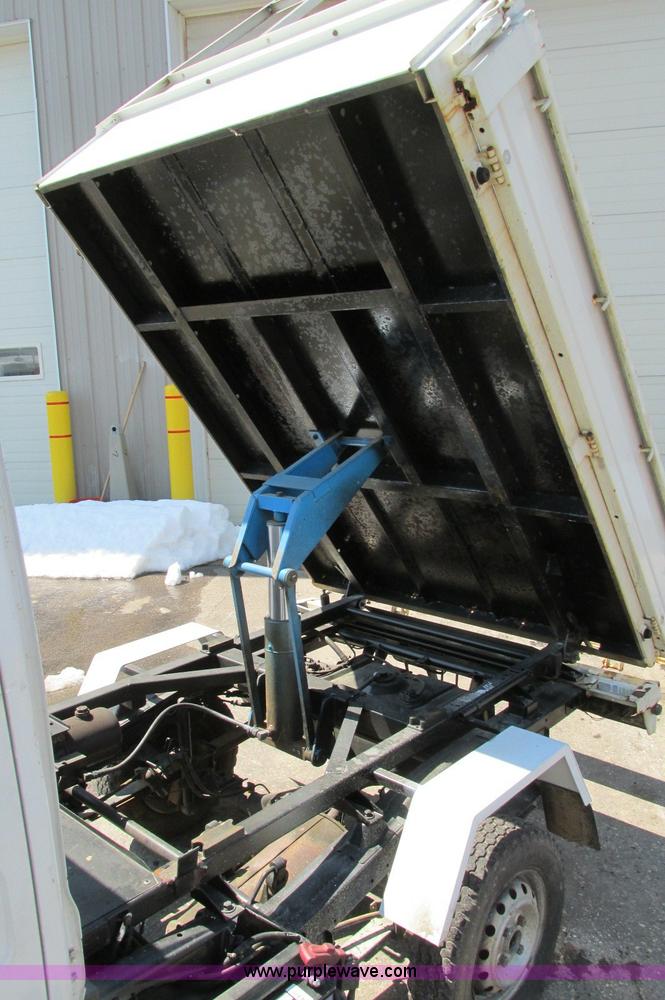 image for item E5072 1999 Mitsubishi minicab truck with dump bed