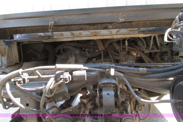 image for item E5072 1999 Mitsubishi minicab truck with dump bed