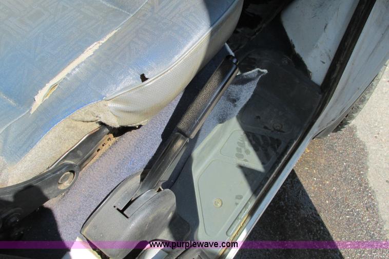 image for item E5072 1999 Mitsubishi minicab truck with dump bed